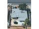 Aerial shot of a home including the layout, backyard pool, driveway, roof, and bordering yards at 5178 Wilbur St, Las Vegas, NV 89119