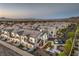 Expansive aerial view of a well-planned community nestled against a mountain backdrop at 545 Thea St # 1315, Henderson, NV 89052