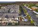 Expansive aerial view of new construction townhomes with desert landscaping and ample parking at 545 Thea St # 1315, Henderson, NV 89052