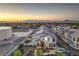 Aerial view of modern townhomes with desert landscaping and mountain views at 545 Thea St # 1315, Henderson, NV 89052