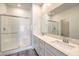 Modern bathroom with double sinks, a walk-in shower, and sleek finishes at 545 Thea St # 1315, Henderson, NV 89052