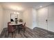 Cozy dining area with contemporary furnishings and a stylish light fixture at 545 Thea St # 1315, Henderson, NV 89052