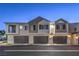 Modern townhome complex with attached garages at 545 Thea St # 1315, Henderson, NV 89052