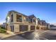 Street view of modern townhomes with private garages and balconies at 545 Thea St # 1315, Henderson, NV 89052