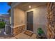 Charming front entrance with stone accents and a welcoming 'welcome' mat at 545 Thea St # 1315, Henderson, NV 89052