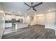 Open-concept kitchen with stainless steel appliances and a large island at 545 Thea St # 1315, Henderson, NV 89052