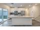 Modern kitchen featuring a large island, sleek appliances, and ample counter space at 545 Thea St # 1315, Henderson, NV 89052