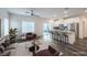 Bright, open-concept living room and kitchen with modern finishes and stainless steel appliances at 545 Thea St # 1315, Henderson, NV 89052