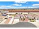 An aerial view of a single-story stucco home with a two car garage and desert landscaping at 5505 Verbena Creek Ct, Las Vegas, NV 89131