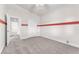 This is a bedroom with neutral carpet, white walls, and a ceiling fan at 5505 Verbena Creek Ct, Las Vegas, NV 89131