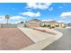 Spacious single-story home with a long driveway and low-maintenance desert landscaping at 5505 Verbena Creek Ct, Las Vegas, NV 89131