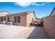Spacious backyard with patio, boat parking, and privacy wall under a blue sky at 5600 Old Stable Ave, Las Vegas, NV 89131
