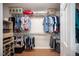 Walk-in closet has built-in shelving and racks for optimal storage solutions at 5600 Old Stable Ave, Las Vegas, NV 89131