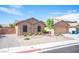 Well-kept xeriscaped front yard of a home with neutral color scheme at 5600 Old Stable Ave, Las Vegas, NV 89131