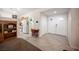 The foyer has ceramic tile flooring and a view of the kitchen at 5600 Old Stable Ave, Las Vegas, NV 89131