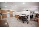 Open-concept kitchen has tile floors, and shares space with an eat-in dining area and living room at 5600 Old Stable Ave, Las Vegas, NV 89131