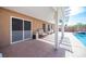 Covered patio with pool access, ideal for relaxing and entertaining outdoors at 5600 Old Stable Ave, Las Vegas, NV 89131