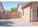 View of the side yard and a gate at 5600 Old Stable Ave, Las Vegas, NV 89131