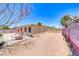 Large backyard with patio and ample space for outdoor activities and landscaping at 6 Montana Way, Henderson, NV 89015