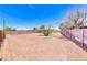 Expansive backyard with desert landscaping and clear blue skies, ideal for outdoor living at 6 Montana Way, Henderson, NV 89015