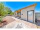 Quaint single-story home with a covered porch and easy-care desert landscaping at 6 Montana Way, Henderson, NV 89015