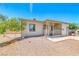 Inviting single-story home featuring a covered porch and low-maintenance desert landscaping at 6 Montana Way, Henderson, NV 89015