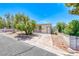 Cozy single-story home with well-maintained landscaping and a welcoming front porch at 6 Montana Way, Henderson, NV 89015