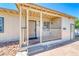 Inviting covered porch with a cozy entrance, perfect for relaxing and enjoying the outdoors at 6 Montana Way, Henderson, NV 89015