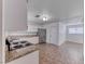 Well-lit kitchen with stainless steel appliances and ample counter space for cooking at 6204 Parsifal Pl, Las Vegas, NV 89107