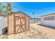 Backyard shed for extra storage and space, in a yard ready for custom landscaping at 6204 Parsifal Pl, Las Vegas, NV 89107