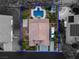 Aerial view showcases the layout of the home, pool, RV parking, and surrounding landscape at 6245 Galileo Dr, Las Vegas, NV 89149