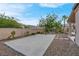 Outdoor basketball court and low-maintenance gravel landscaping in a well-manicured backyard at 6245 Galileo Dr, Las Vegas, NV 89149