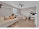 Stylized bedroom with a comfy sofa and plenty of room for entertainment and hobbies at 6245 Galileo Dr, Las Vegas, NV 89149