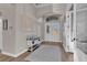 View of the foyer with double entry doors, hardwood floors, decor, and an open doorway at 6245 Galileo Dr, Las Vegas, NV 89149