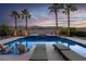 Gorgeous swimming pool and spa with desert landscaping and mountain views at 6245 Galileo Dr, Las Vegas, NV 89149