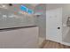 The modern walk-in shower features subway tile, a glass enclosure, and brushed nickel fixtures at 6245 Galileo Dr, Las Vegas, NV 89149