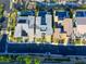 An aerial view showing the houses, neighborhood streets, backyards and swimming pools at 6570 Aurora View St, Las Vegas, NV 89135