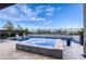 Resort-style pool featuring a spa and water feature, perfect for relaxation and entertainment at 6570 Aurora View St, Las Vegas, NV 89135
