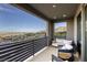 Relax on this outdoor balcony with mountain and city views at 6570 Aurora View St, Las Vegas, NV 89135
