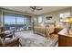 Sun-filled bedroom featuring access to the home's balcony at 6570 Aurora View St, Las Vegas, NV 89135