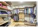 Organized walk-in closet provides ample storage space at 6570 Aurora View St, Las Vegas, NV 89135