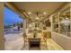 Enjoy outdoor living on this expansive patio with a dining area and views of the pool at 6570 Aurora View St, Las Vegas, NV 89135