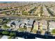 A modern home with striking architecture, landscaped front yard, and a two-car garage at 6570 Aurora View St, Las Vegas, NV 89135