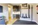 Convenient workout area with wall-mounted equipment and wet bar, integrating fitness into daily living at 6570 Aurora View St, Las Vegas, NV 89135