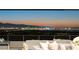 Expansive city view at dusk, highlighting the bright lights of the cityscape at sunset at 671 Scenic Rim Dr, Henderson, NV 89012