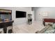 Game room featuring a Pac-Personal arcade game, a large TV, and a classic popcorn machine at 671 Scenic Rim Dr, Henderson, NV 89012