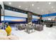 Bright, open-concept living area with stylish furnishings and panoramic views, creating an inviting space at 671 Scenic Rim Dr, Henderson, NV 89012