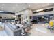 Open-concept living area with stylish decor and a seamless flow to the dining space at 671 Scenic Rim Dr, Henderson, NV 89012