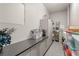 Organized storage room featuring built-in cabinets and countertop, offering ample space for household items and supplies at 671 Scenic Rim Dr, Henderson, NV 89012