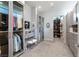 Organized walk-in closet with custom shelving, drawers, and ample storage space at 671 Scenic Rim Dr, Henderson, NV 89012